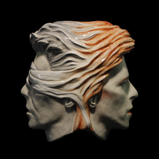 Double head sculpture of Ziggy and Lazarus David Bowie persona created by Maria Primolan Sculptor